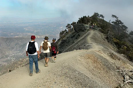 Guests hiking down the trail at Mt Baldy