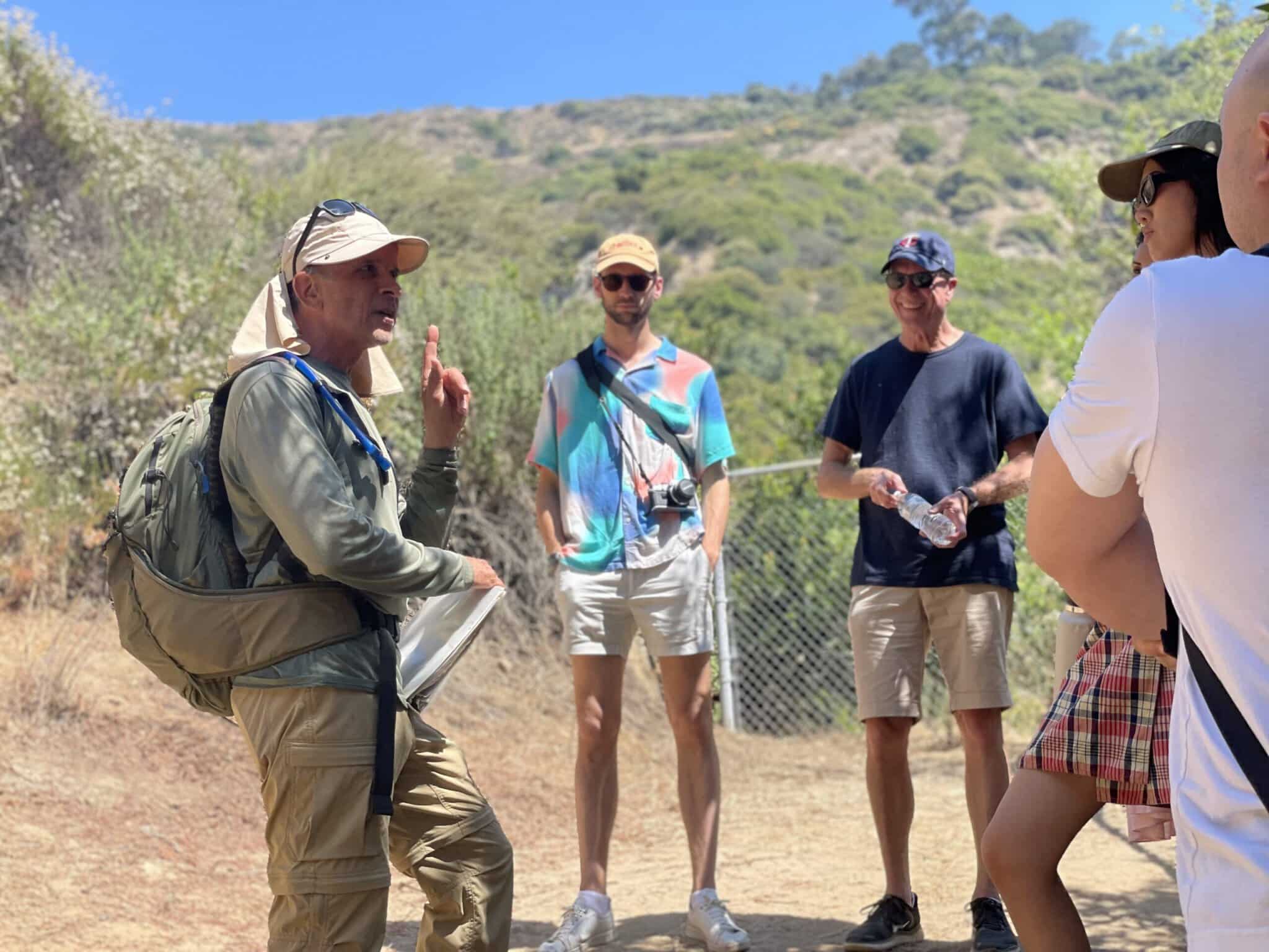 A guide shows the way on the Griffith Observatory Hike Tour