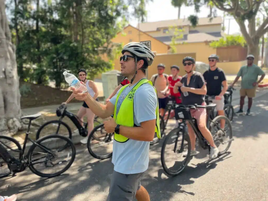 A guide talks to the LA in a Day tour group