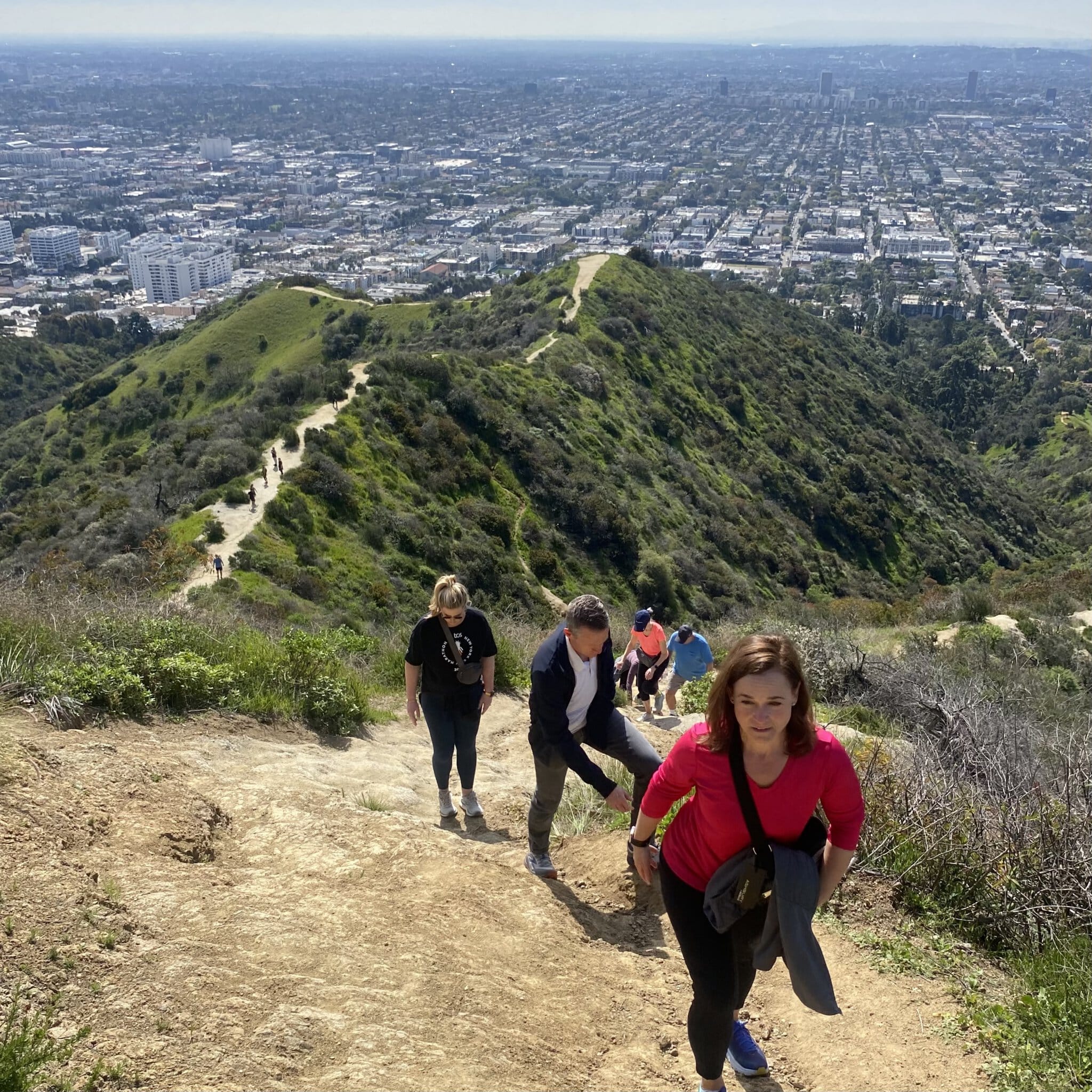 A group climbing Runyon Canyon