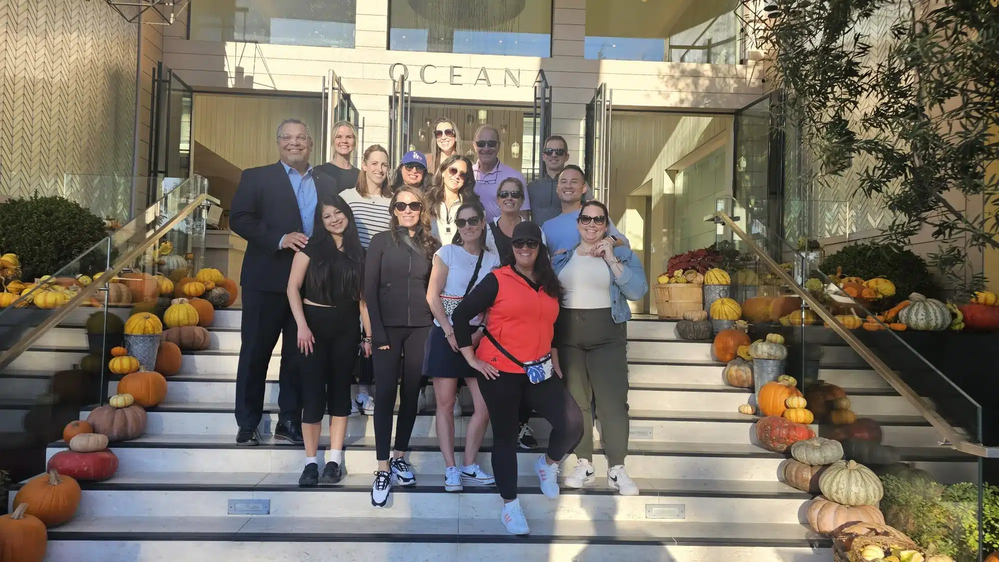 A group in front of their hotel on the Santa Monica and Venice Beach Bike Tour
