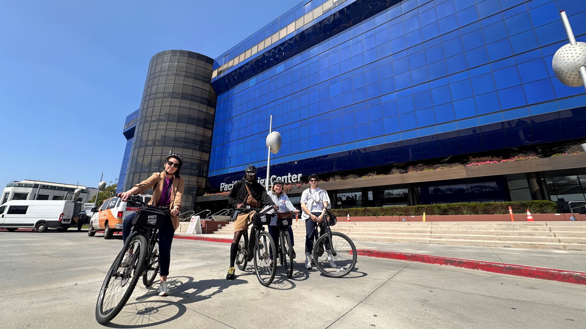 Guests in front of the Pacific Design Center on the West Hollywood Bike Tour
