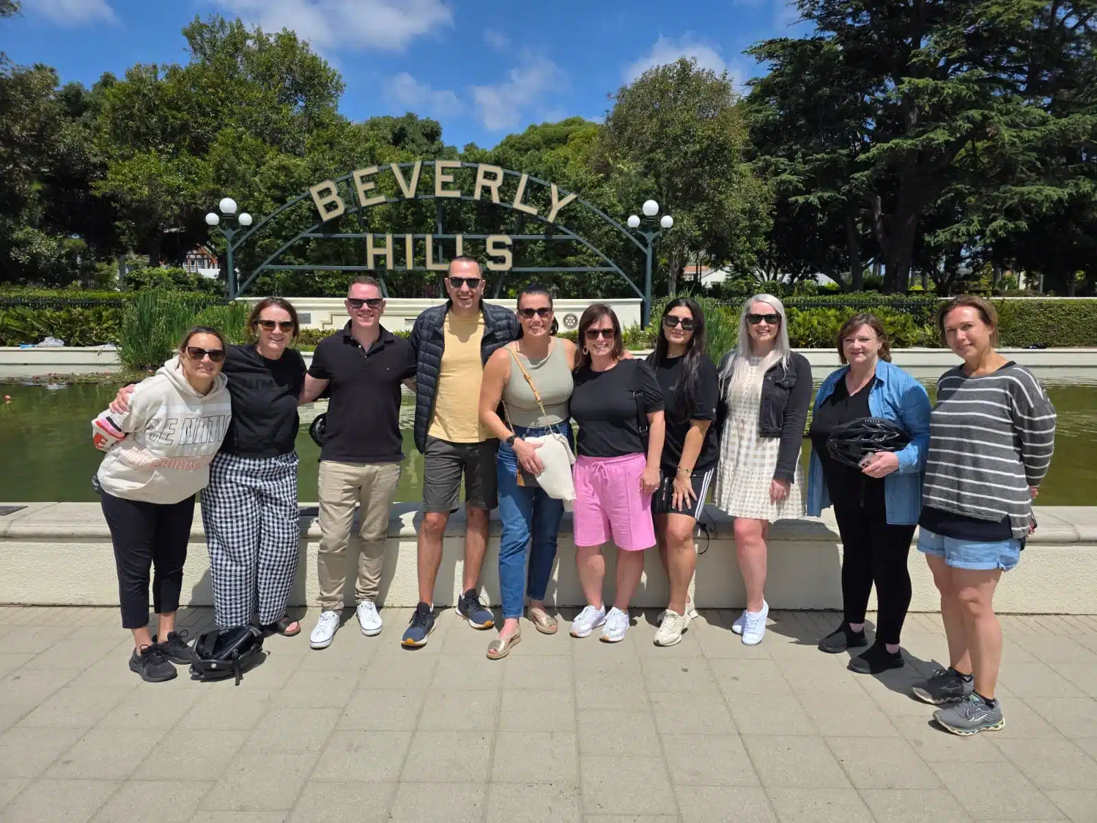 Guests in front of the Beverly Hills Sign