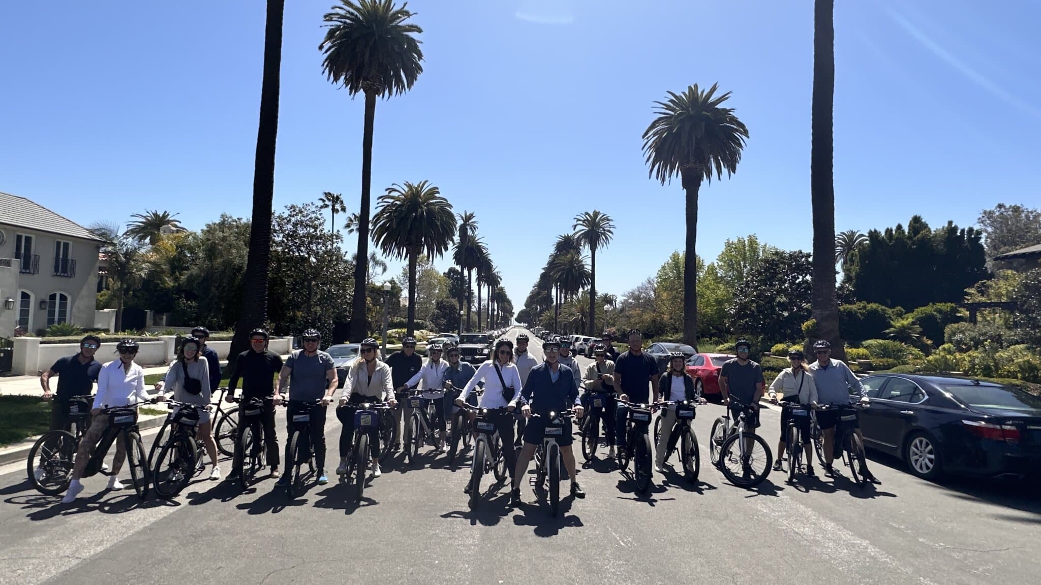 Guests posing with their bikes on the South Bay Bike Tour