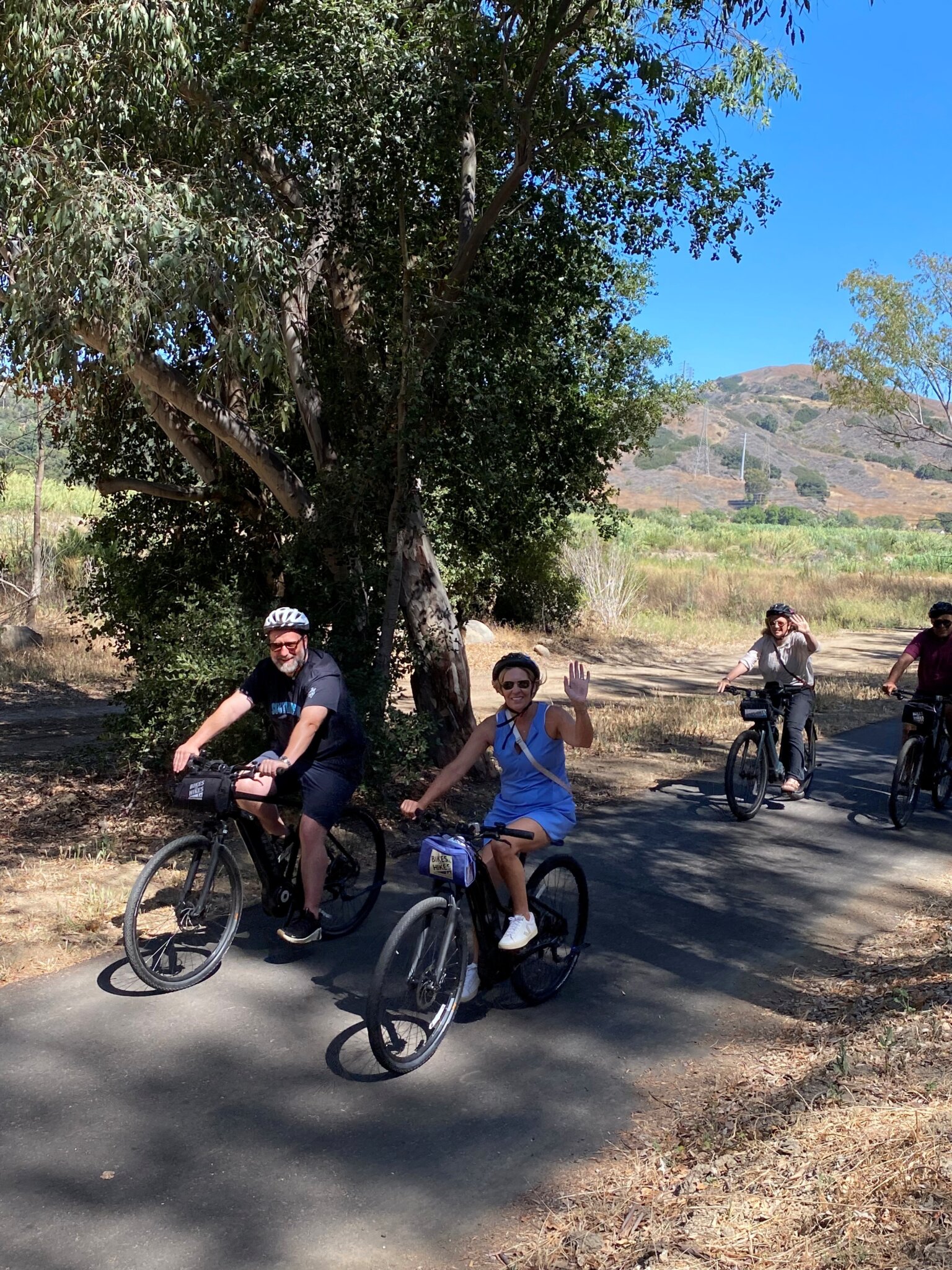 Guests riding on the Ojai Bike Tour on a trail in Ojai