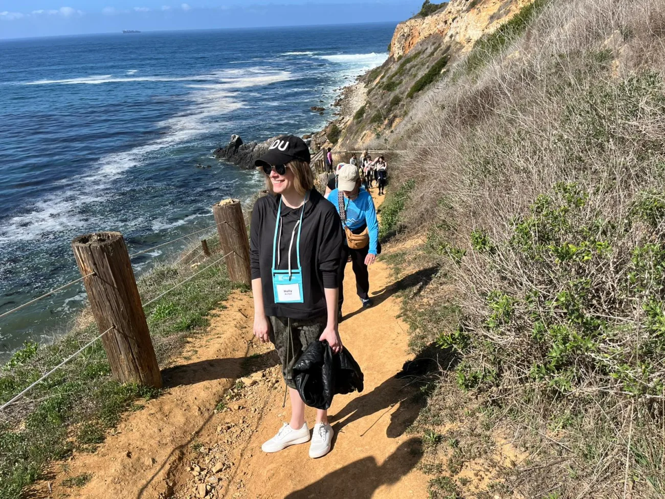 Guests hiking along a coastal cliff trail during a guided Palos Verdes nature walk near Terranea Resort