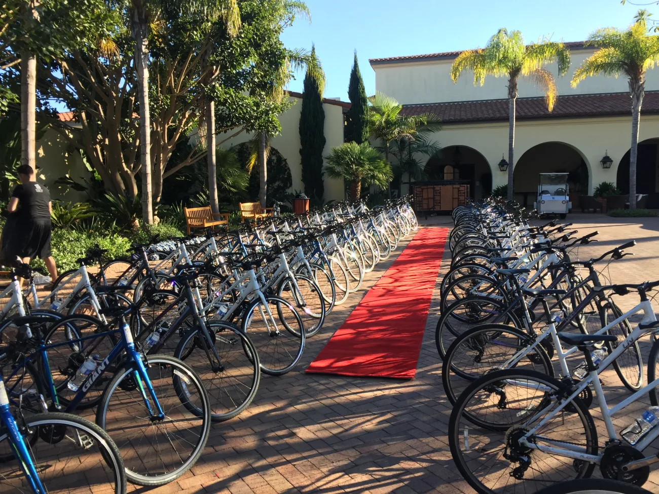 Bikes staged at Terranea resort ready for guests to ride with a red carpet leading the way