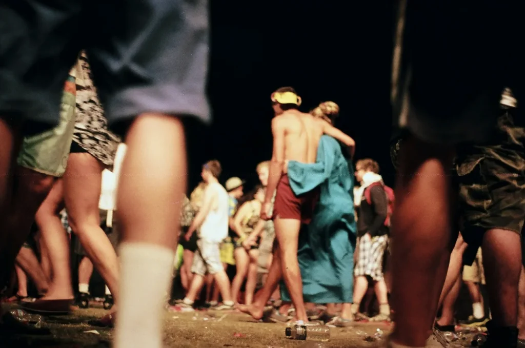 festival goers at Coachella walking around the festival grounds