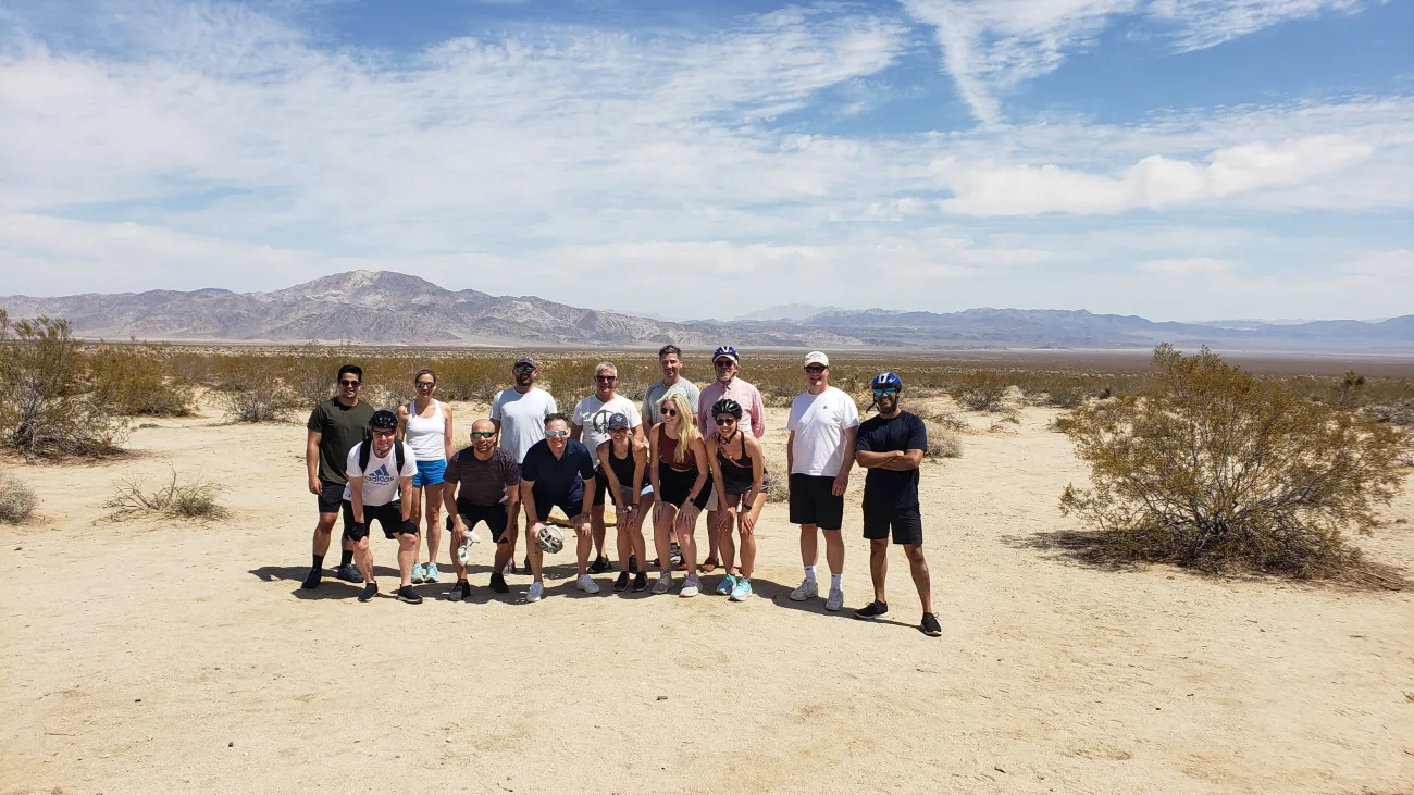 Guests on the Joshua Tree Hiking Tour pose in the Joshua Tree Desert