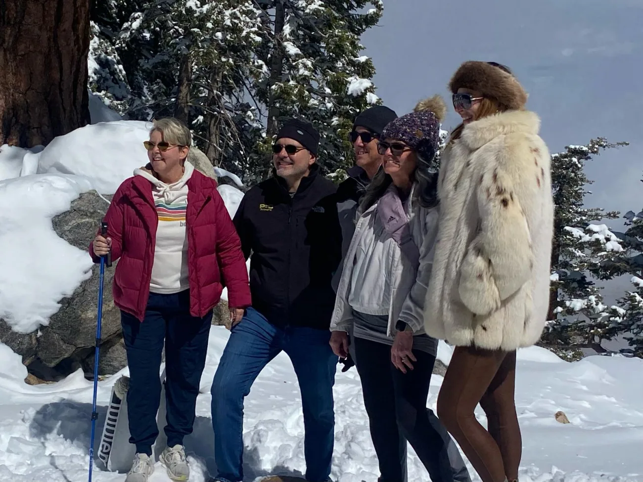 Guests posing in the snow on the palm springs aerial tramride tour