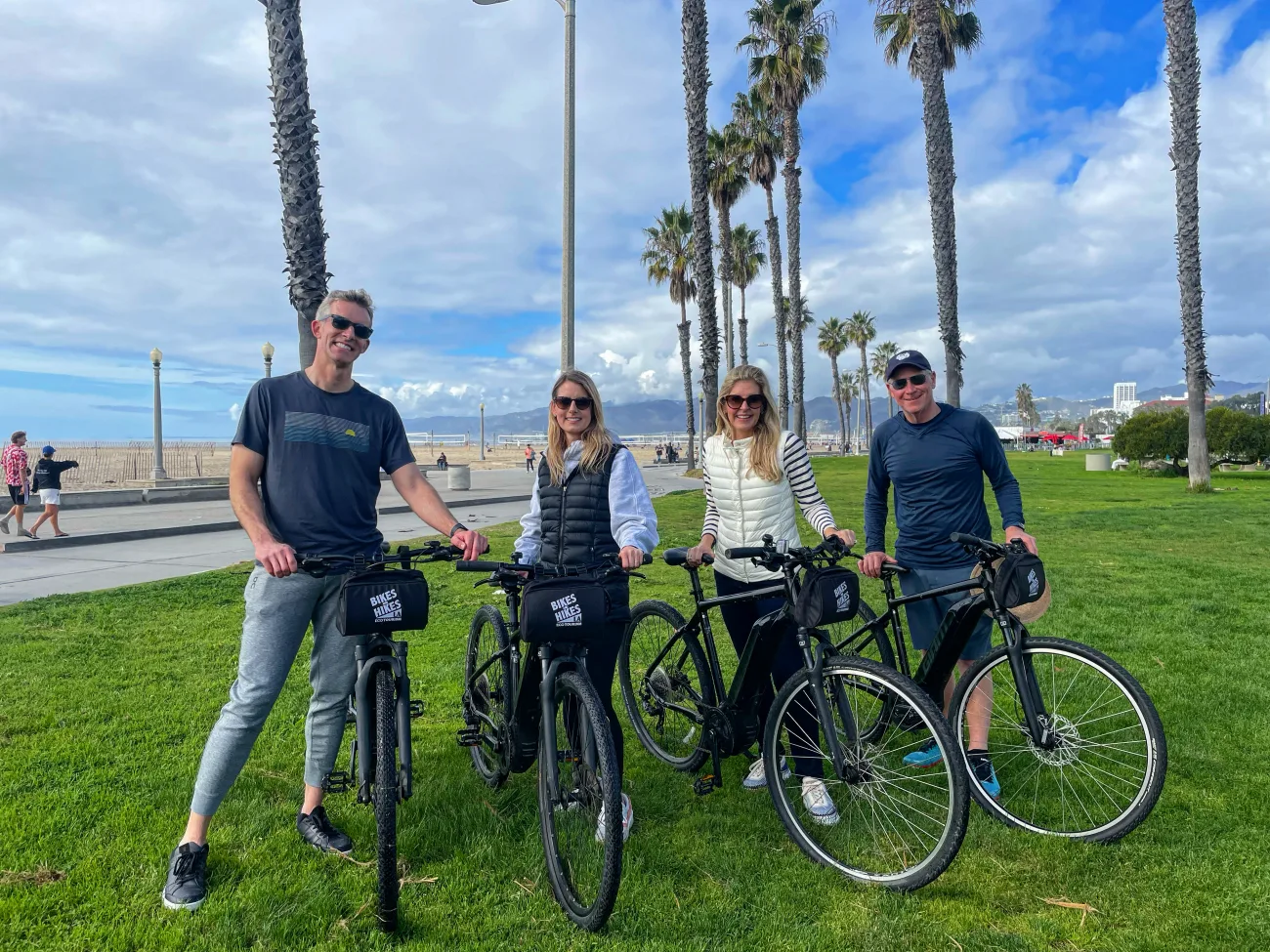 Guests posing with their bikes