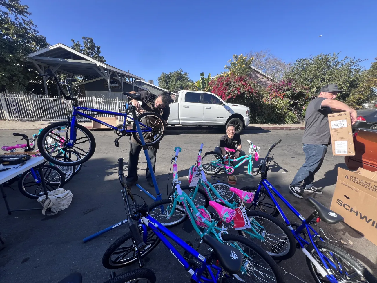 Team members working with bikes