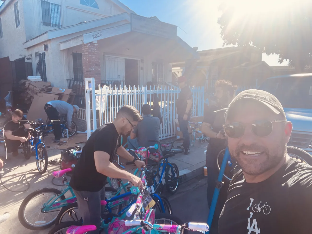 Team members working with bikes