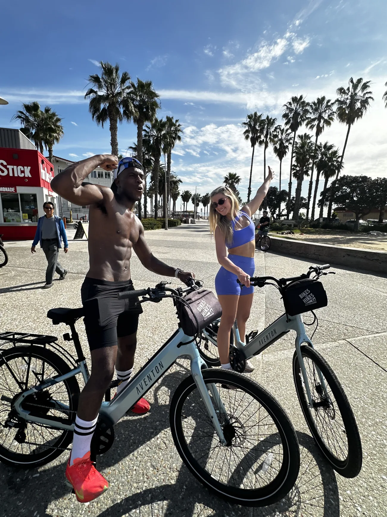 Guests pose on the Venice Boardwalk looking very strong