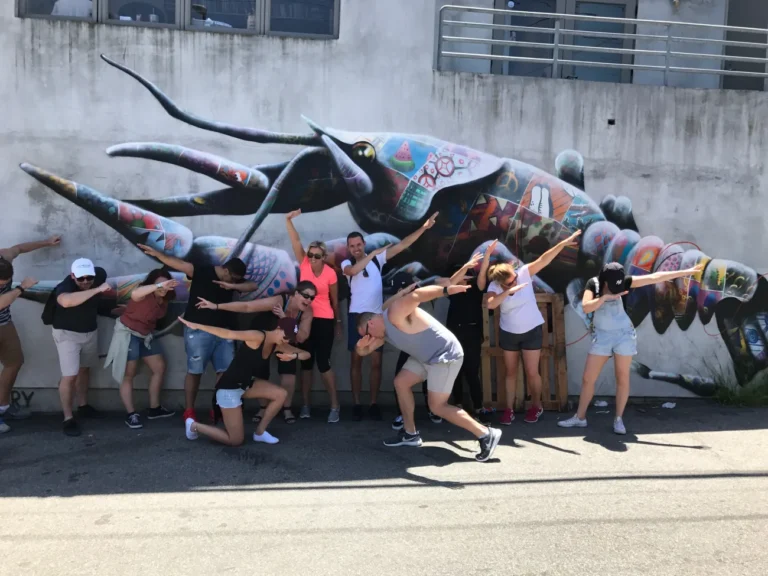 Guests posing with art work in Venice Beach