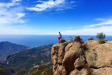 A guest at a viewpoint on the Solstice Canyon Hike