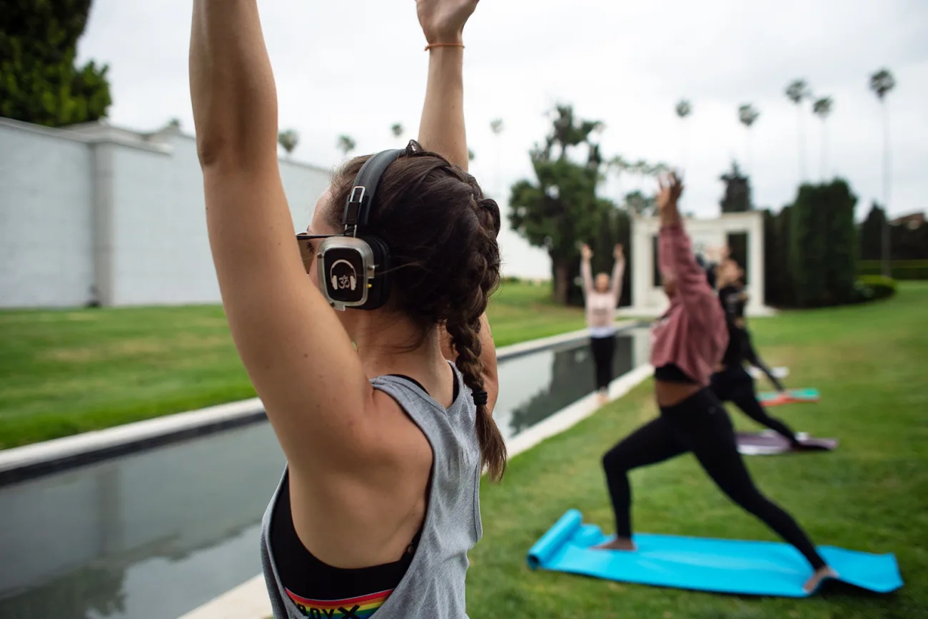 Clients doing yoga at Hollywood Forever Cemetery