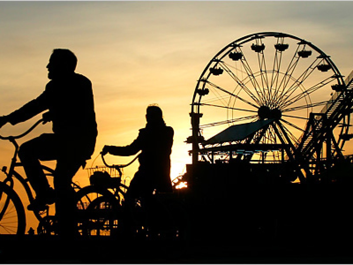 Bikers at Santa Monica Pier at sunset