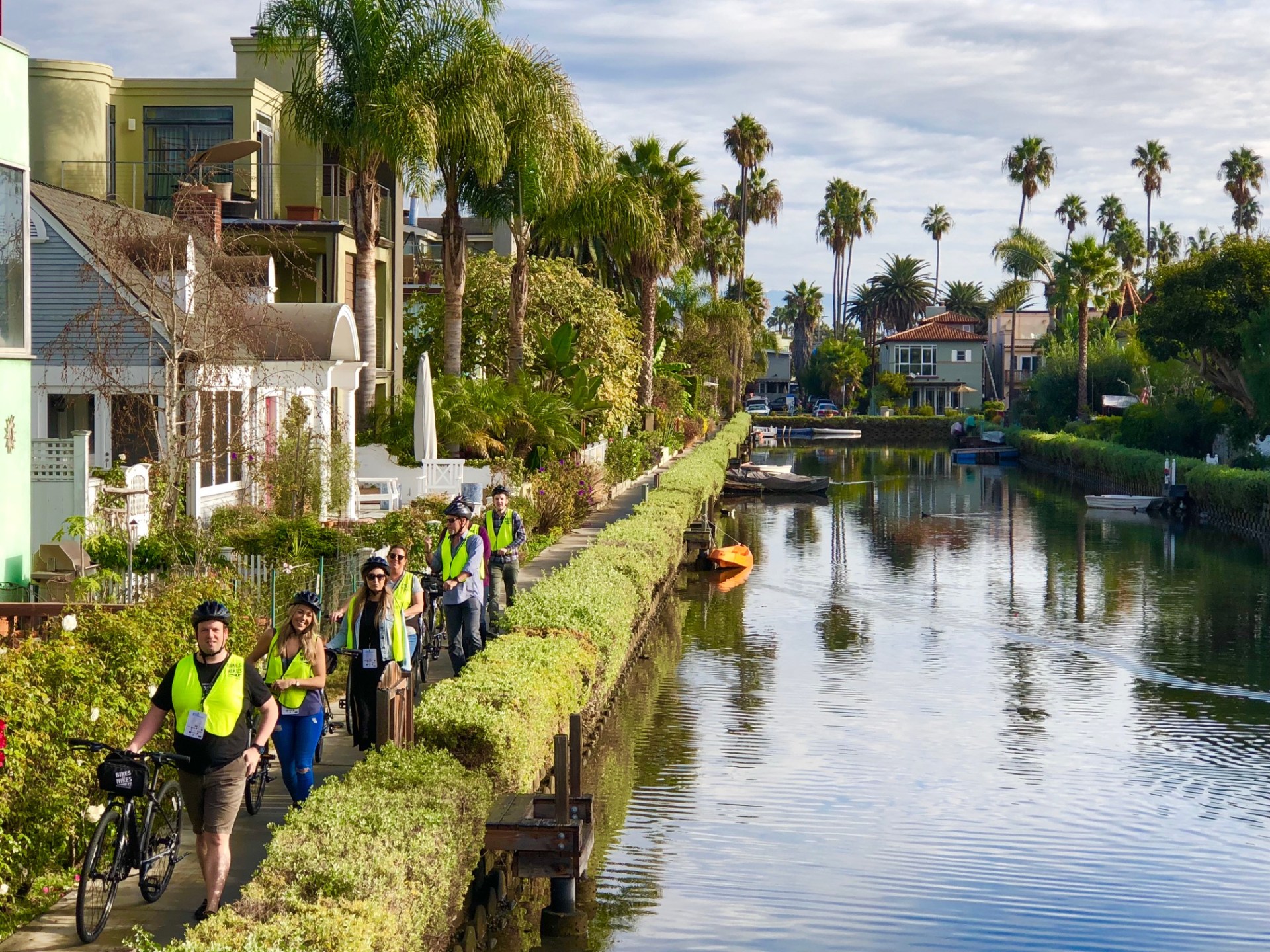 Guests on Bikes and HIkes LA in a Day Tour walking the Venice Canals