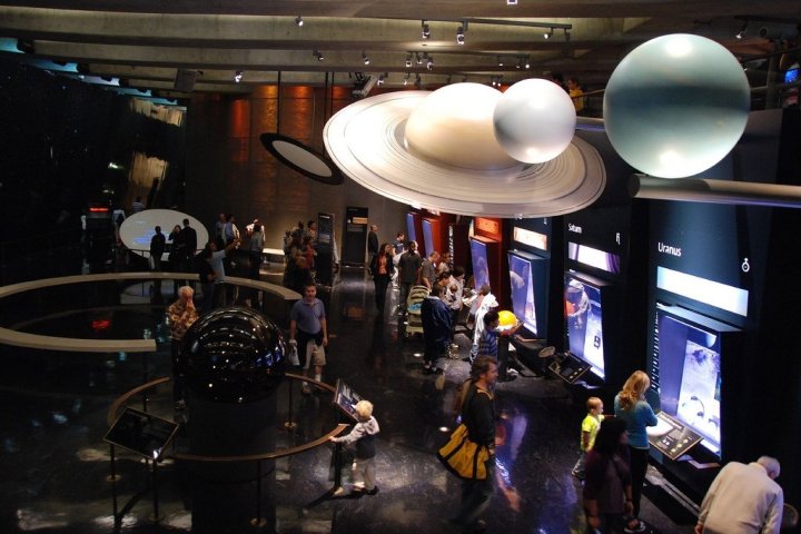 a group of planet models at the griffith observatory museum in LA
