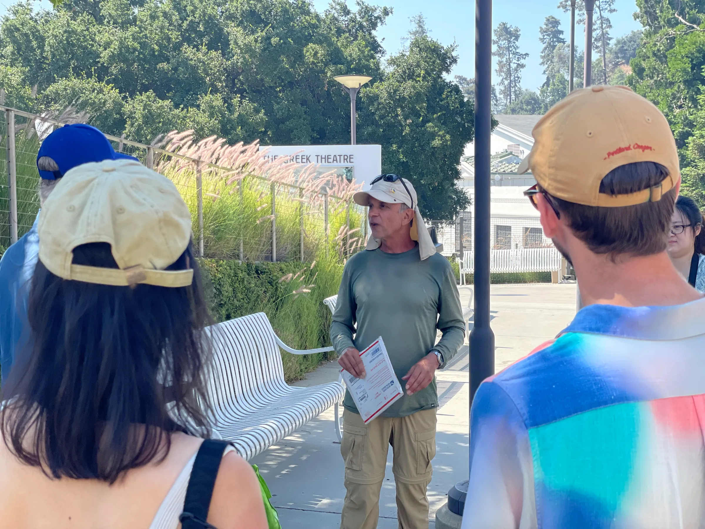 a group of people standing next to a person