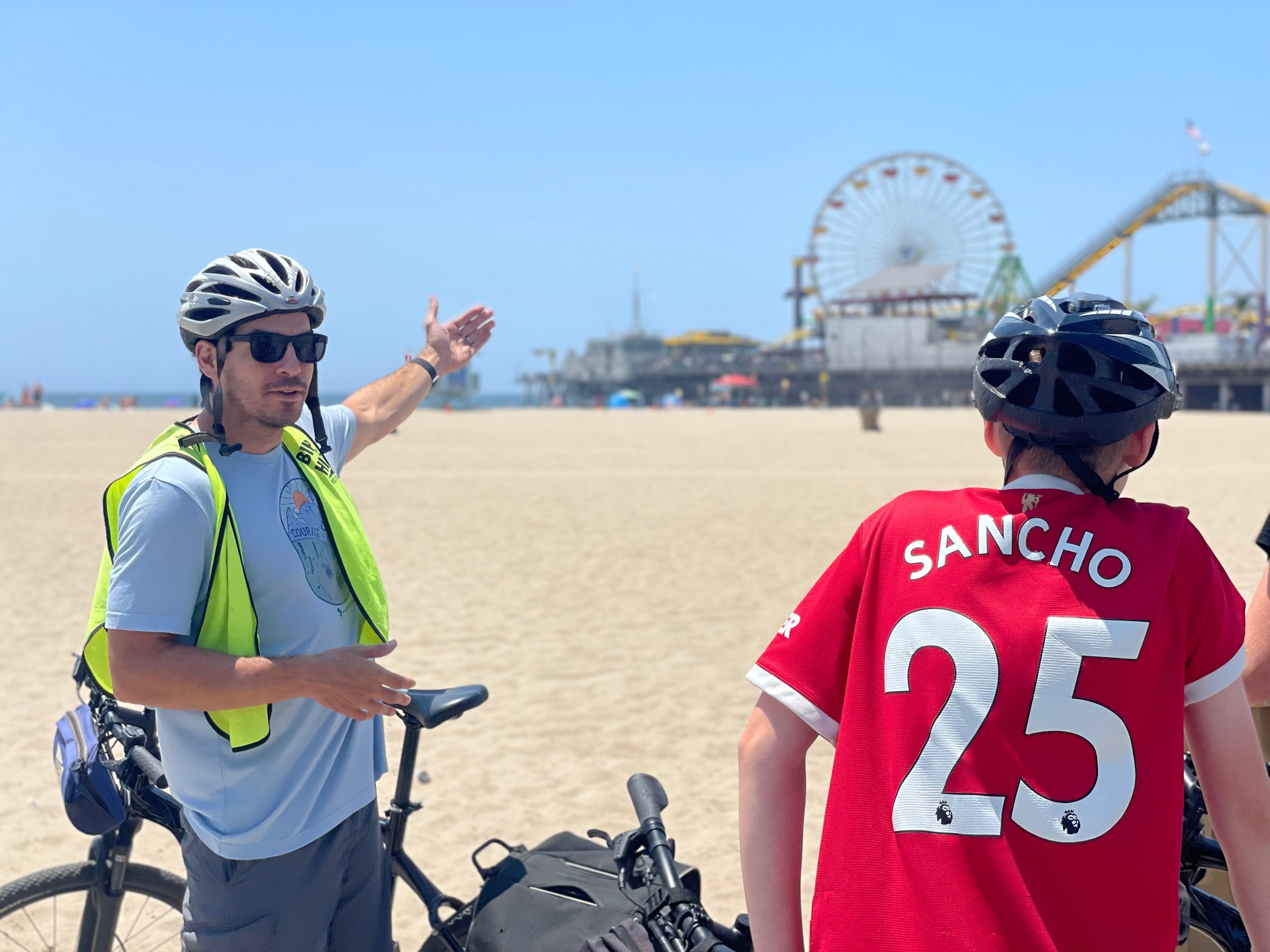 Bikes and Hikes LA Tour Guide giving facts at the Santa Monica Pier