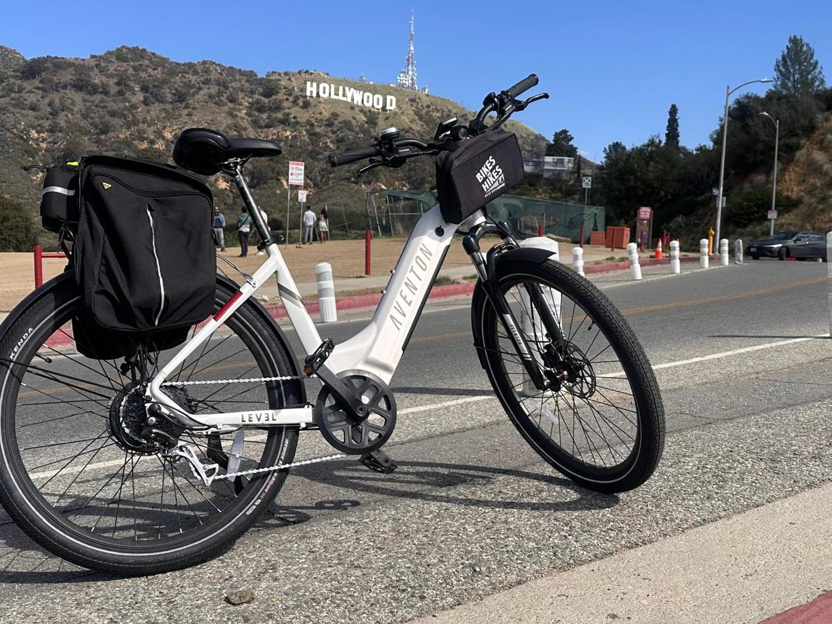 a bicycle parked on the side of a road