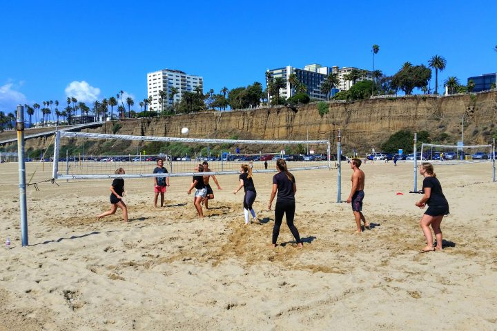 a group of people on a beach
