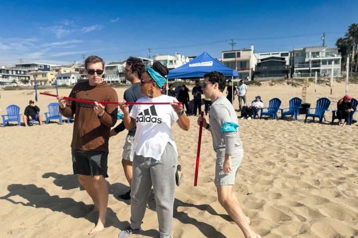 Marble mayhem fun at our team building games on the beach