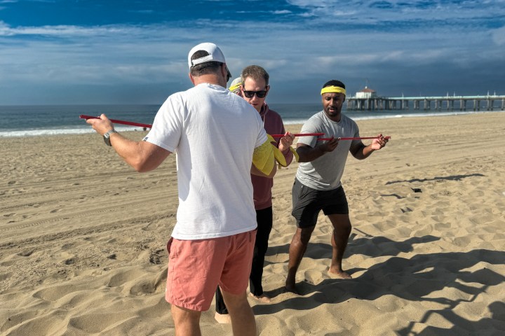 The yellow team working hard at our beach olympics.