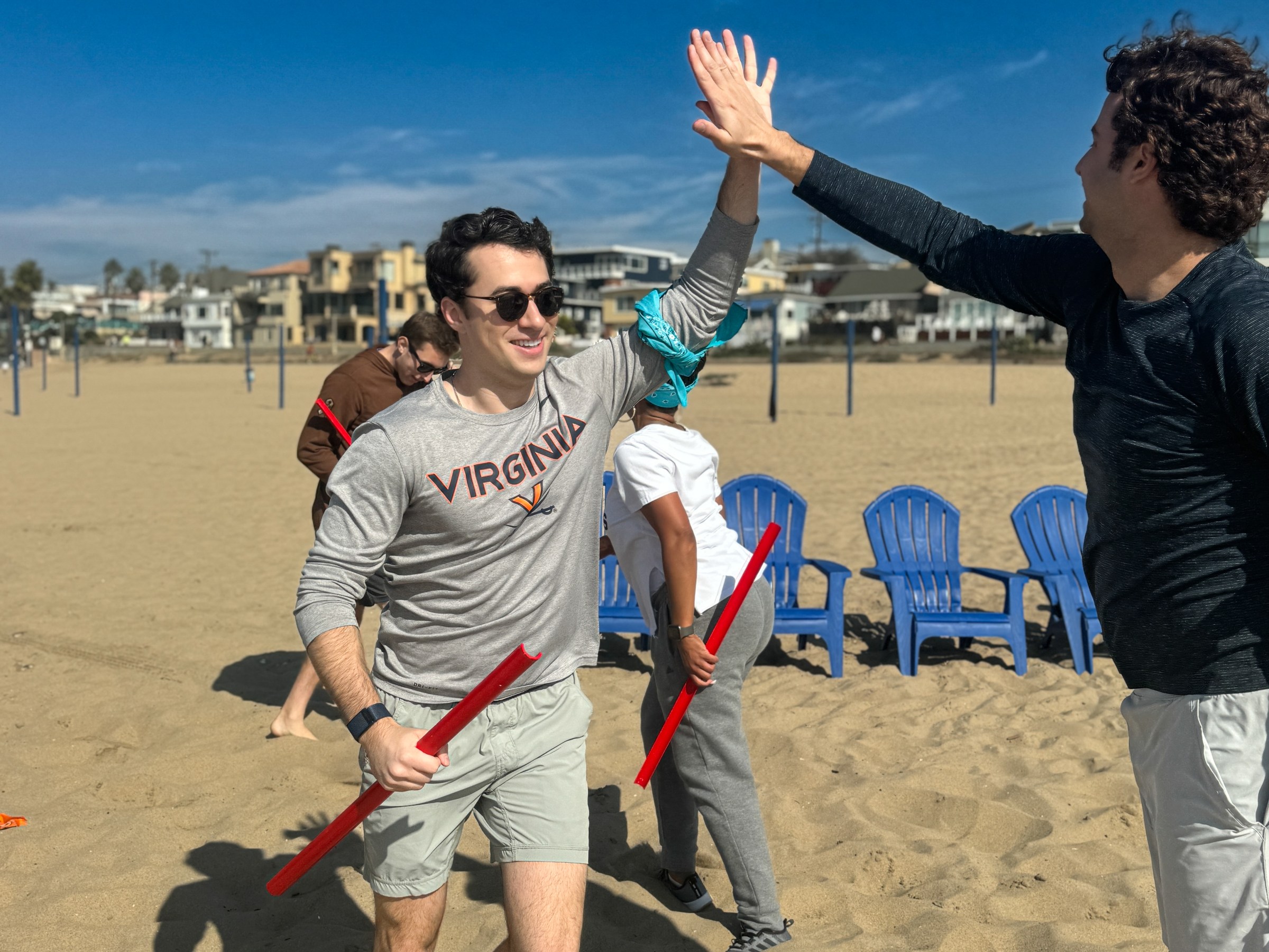 high fives all around at our beach olympics
