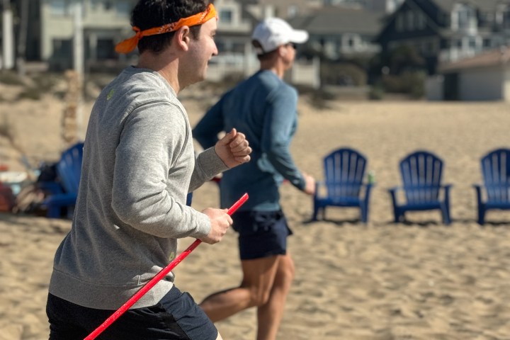 running to the finish line at our team building game outdoors