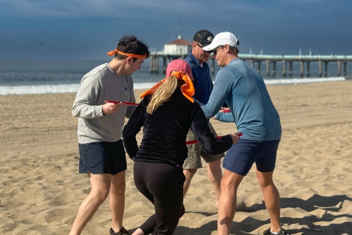 guests competing at bikes and hikes la team building games