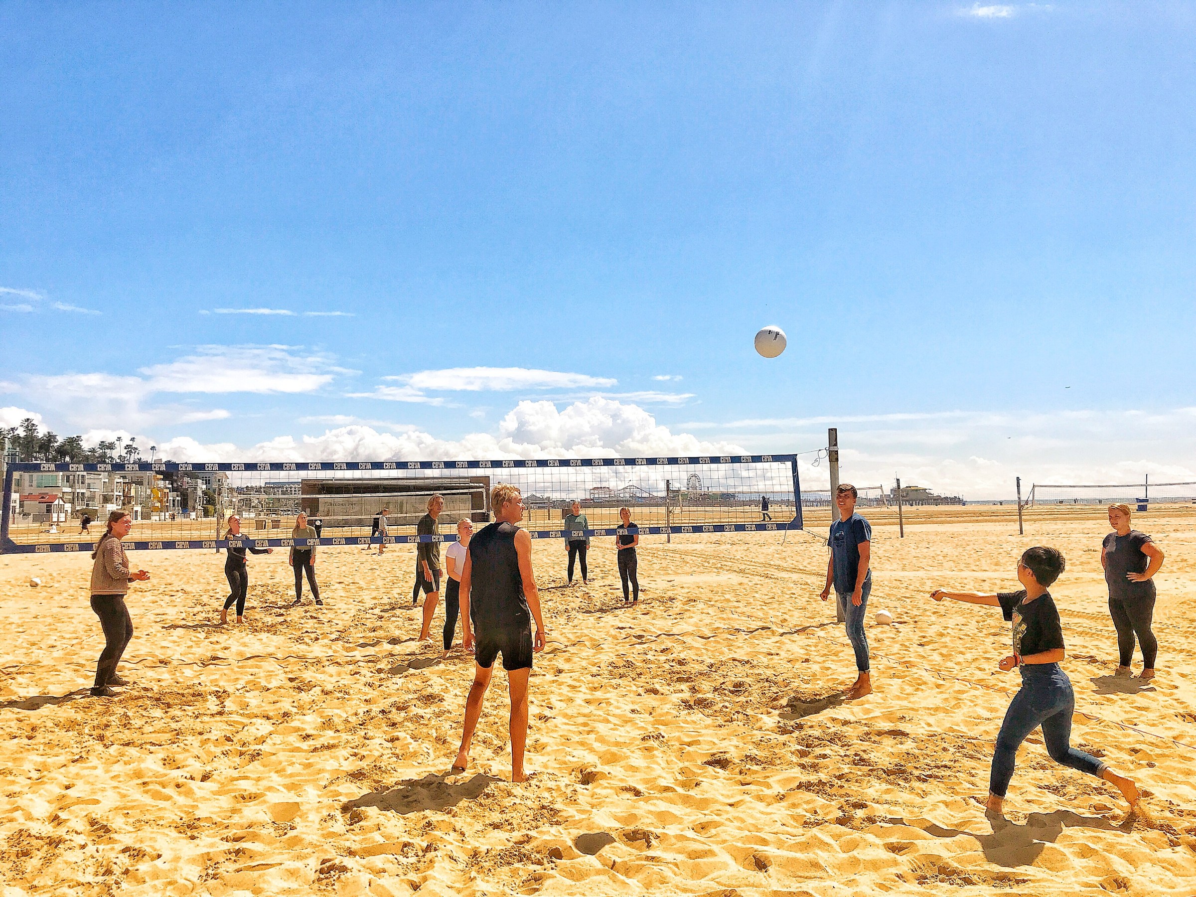 a group of people on a beach