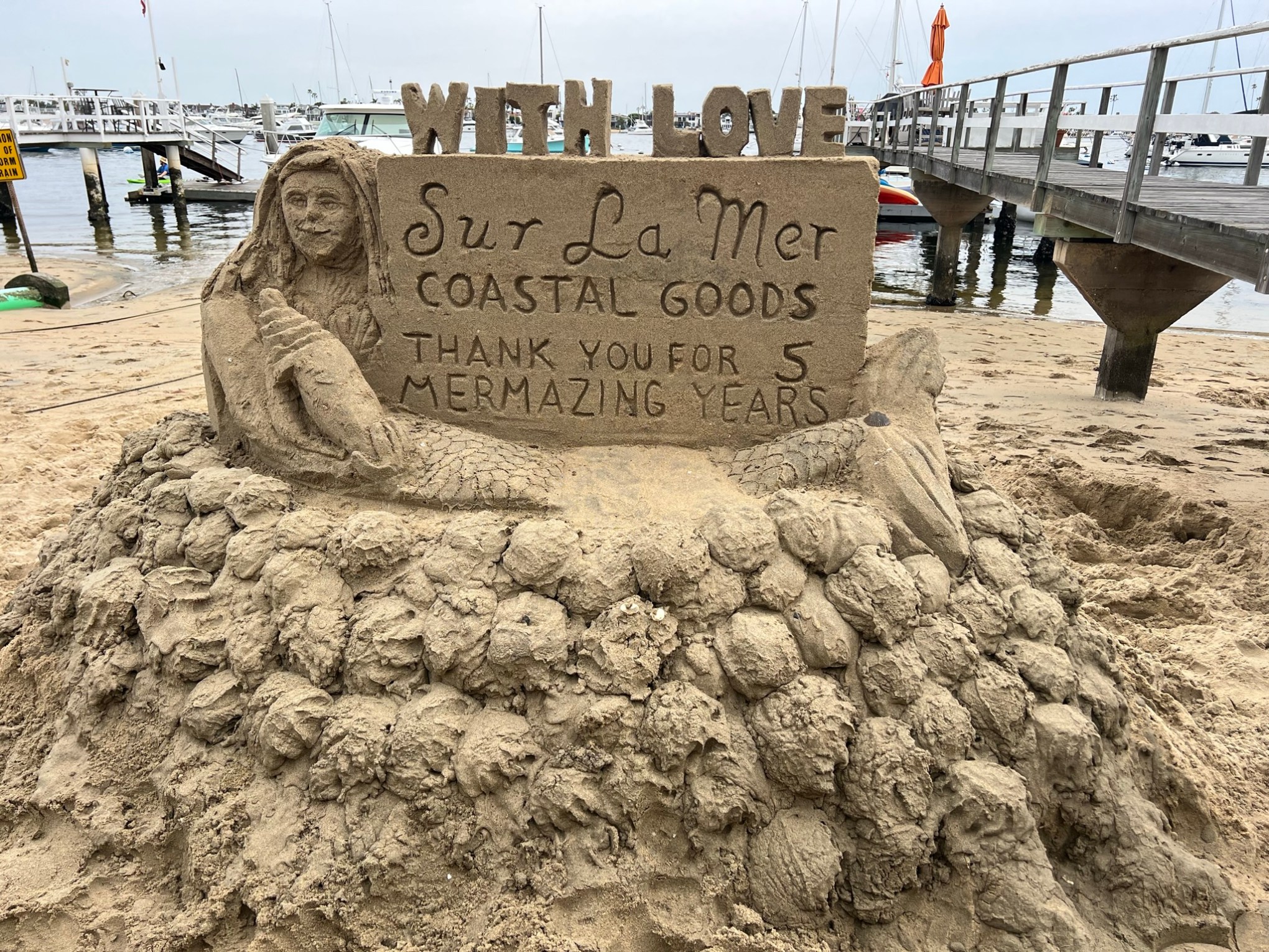 Mermaid logo sandcastle