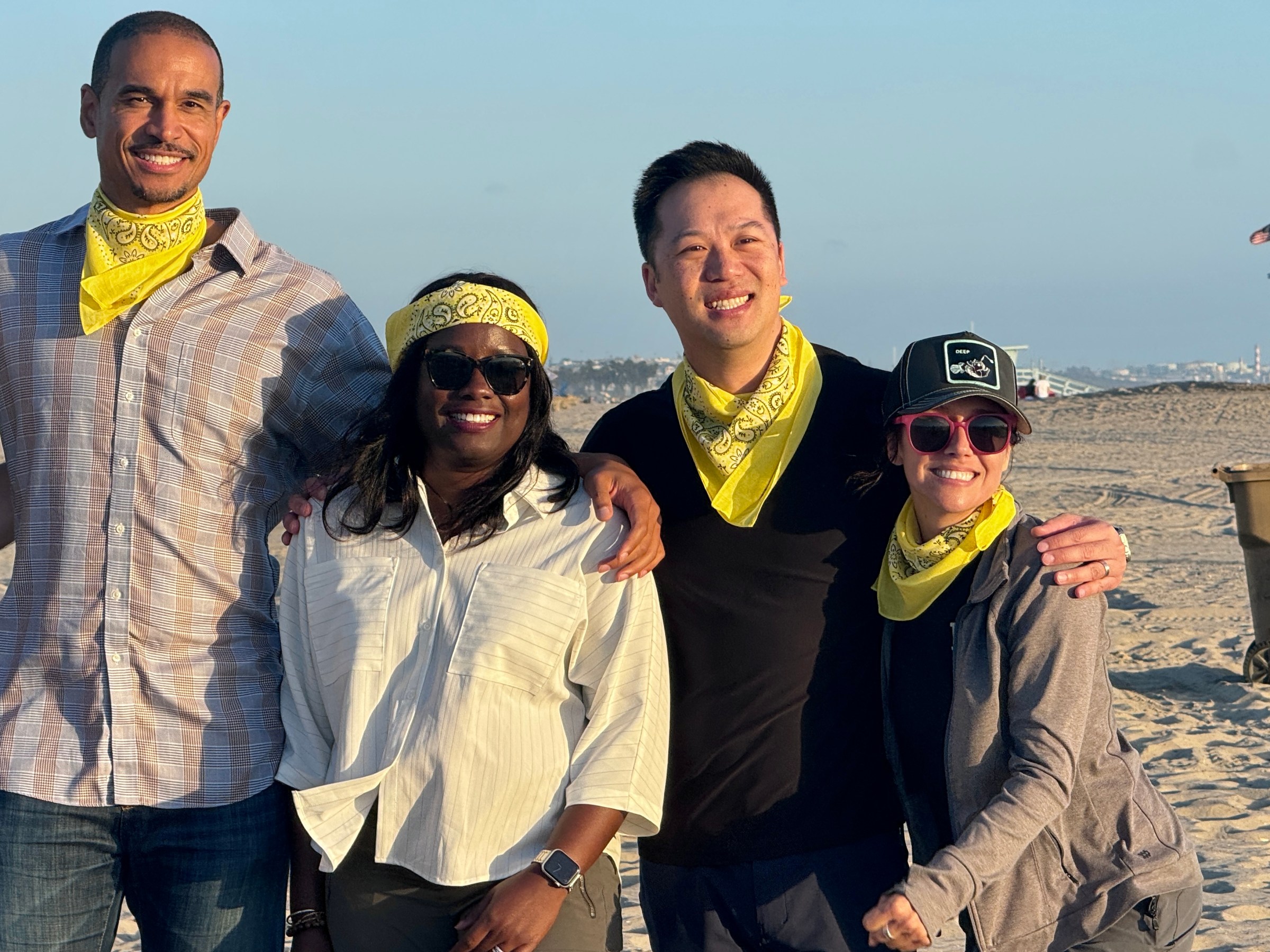 a group of people posing for the camera