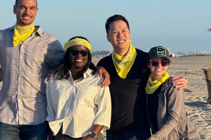 a group of people posing for the camera