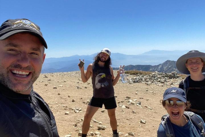 a group of people posing for the camera