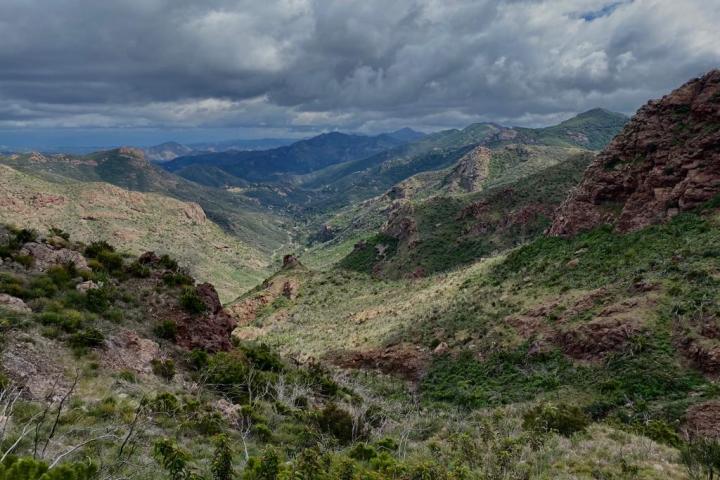 a canyon with a mountain in the background