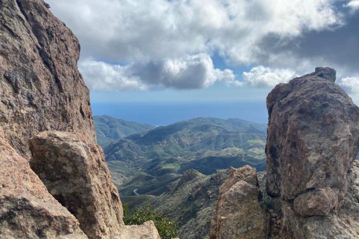 a canyon with a mountain in the background