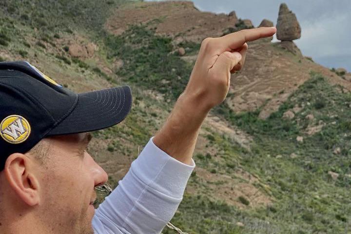 a man standing on top of a mountain
