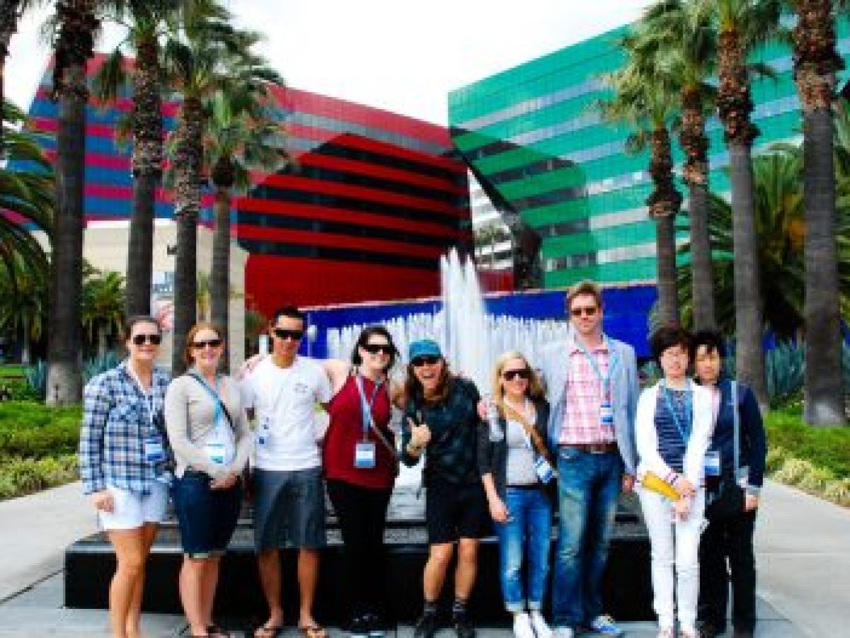 Group posing in front of Downtown Los Angeles