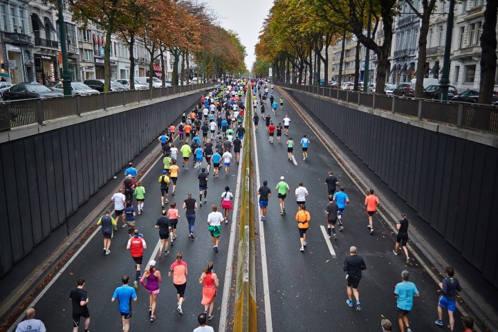 marathon runners on street