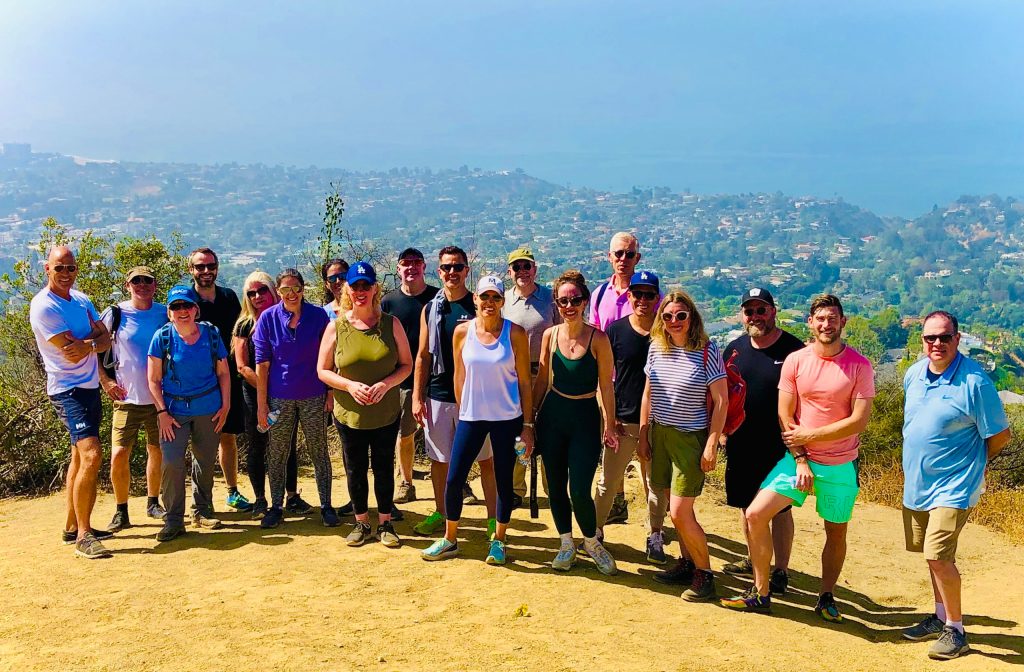 a group of people on a los angeles tour in santa monica