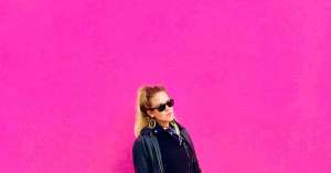 Girl at Pink Wall