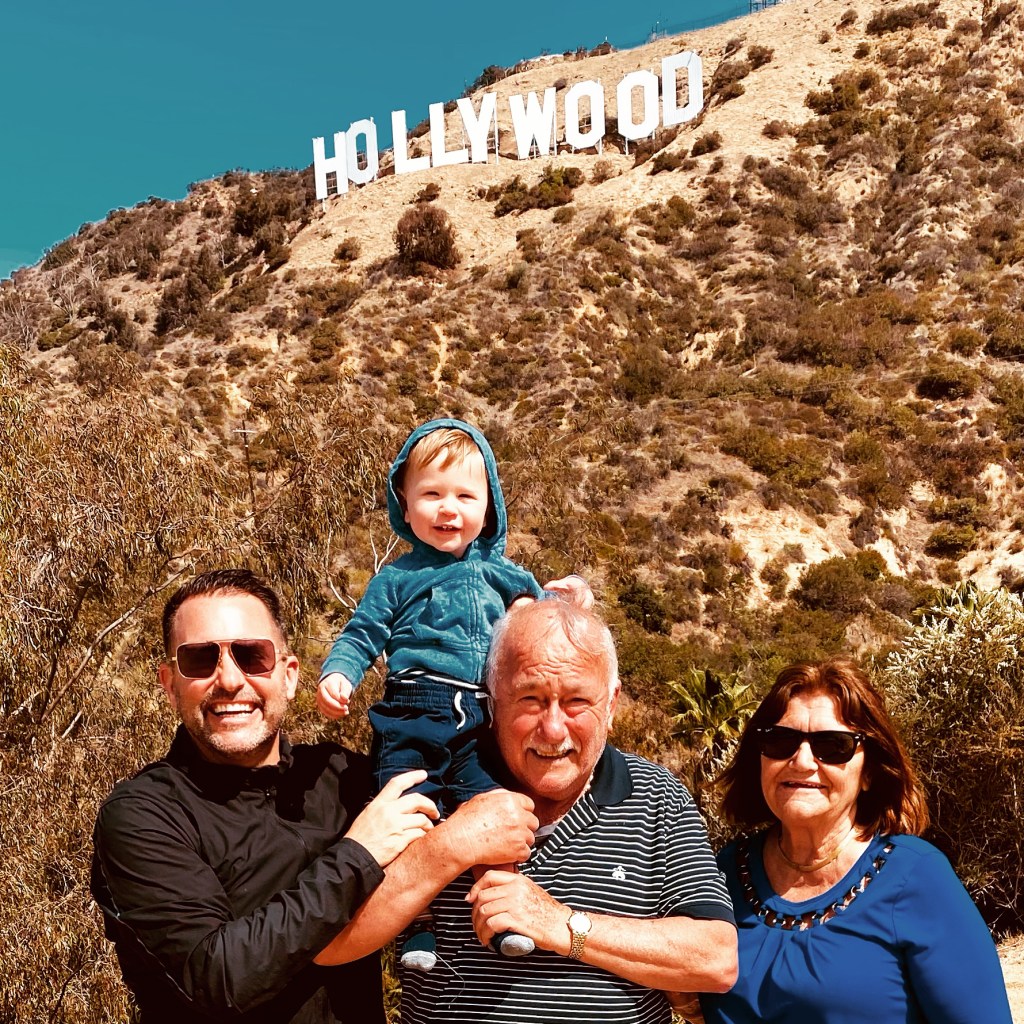 Brian Levant et al. posing for the camera