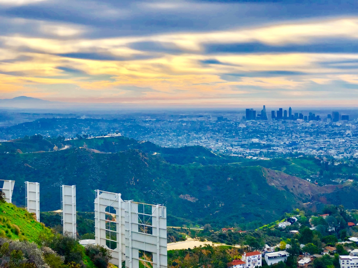 view of los angeles from behind the hollywood sign