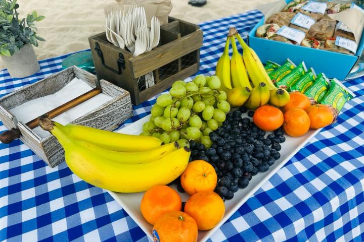 a bowl of fruit on a table