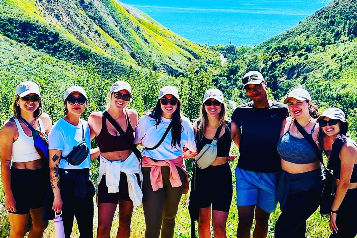 a group of people posing for a photo on an la hike tour