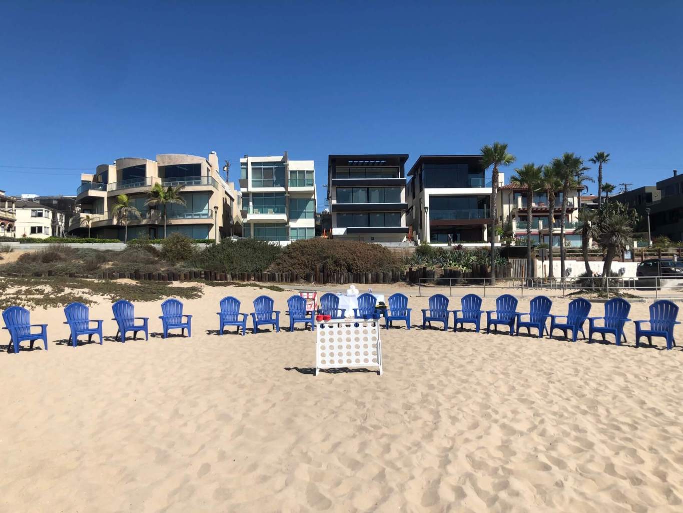 beach chairs lined up on beach